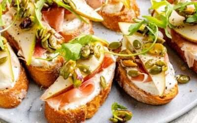 Ricotta and Pear Crostini with Salty Pumpkin Seed Pistachio Crunch