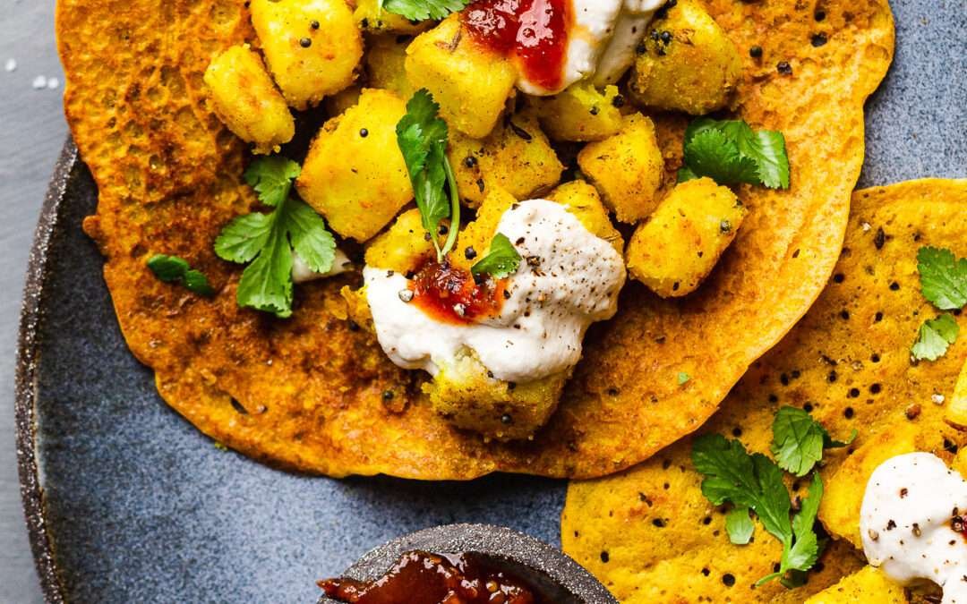 Masala potatoes on red lentil pancakes